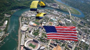 Navy Seals pulled of a spectacular parachute jumping on to a packed Stadium stunning the audience