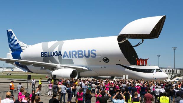 The Airbus Beluga soaring in the sky during its maiden flight in 1994, with its whale-inspired design clearly visible. 