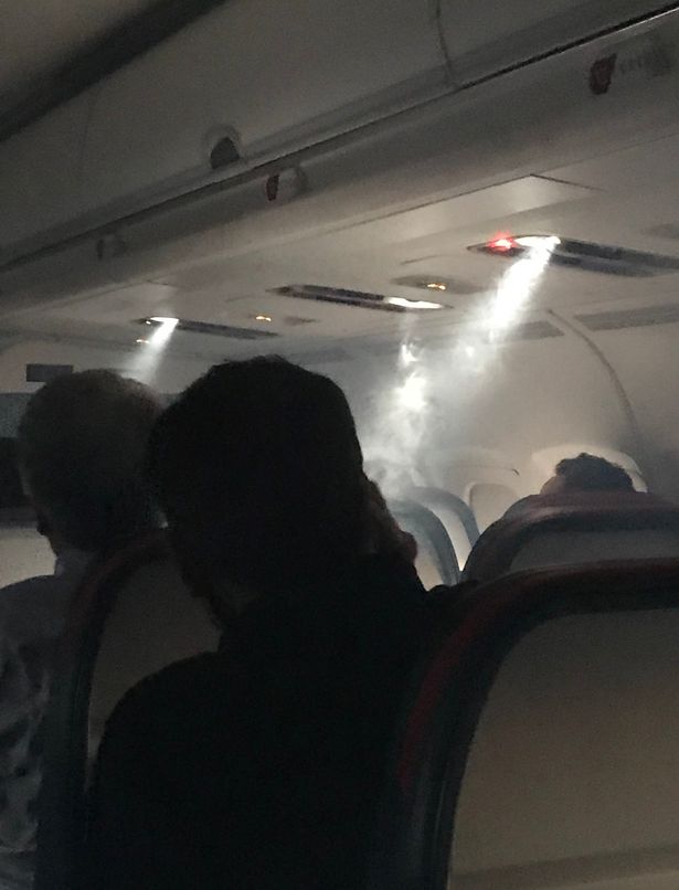 Delta Airlines 'Flight from Hell' passengers forced to climb out through wings after smoke started pouring in the cabin