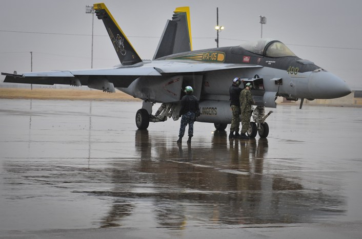 Photos and a video of the U.S. Navy Super Hornets departing Fort Worth for Bush Memorial Flyover under inclement weather