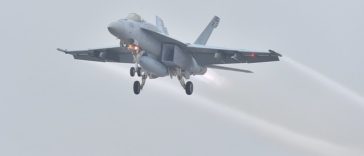 Photos and a video of the U.S. Navy Super Hornets departing Fort Worth for Bush Memorial Flyover under inclement weather