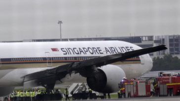 Singapore Airlines; A Boeing 777 catches fire while tow trucks towing it