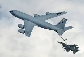 Fighter jet undergoing mid-air refueling during a mission.