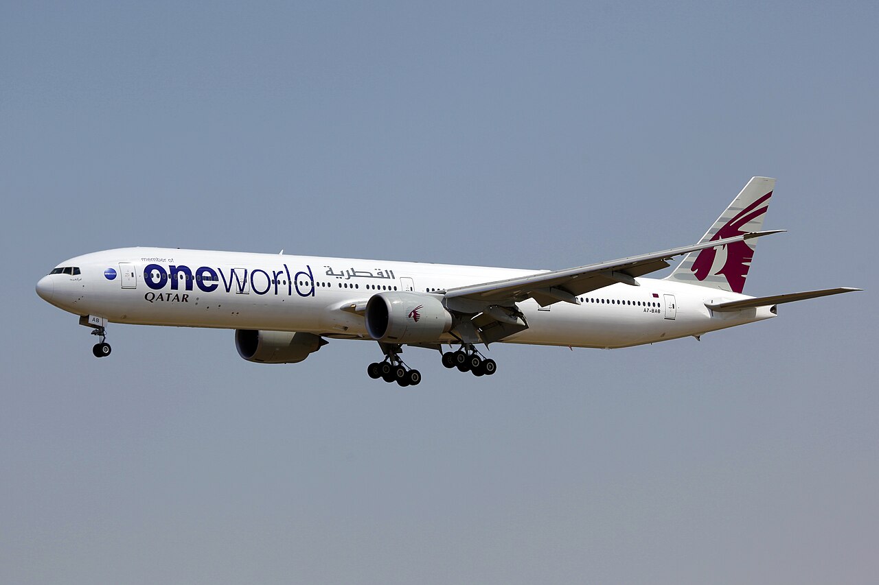 Qatar Airways Launches the Boeing 777-9 in 2026 2 Interior rendering of the next-generation Qsuite business class aboard the Boeing 777-9, showing individual suites with privacy doors and large entertainment screens