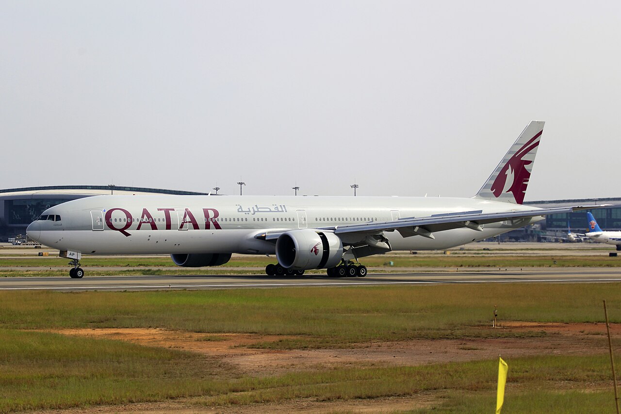 Qatar Airways Launches the Boeing 777-9 in 2026 3 Boeing 777-9 full flight simulator cockpit with two pilots conducting a training session, showing the updated flight deck displays and side screens