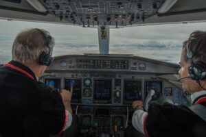 Two airline pilots in the cockpit — the career airline pilot interview questions prepare candidates for