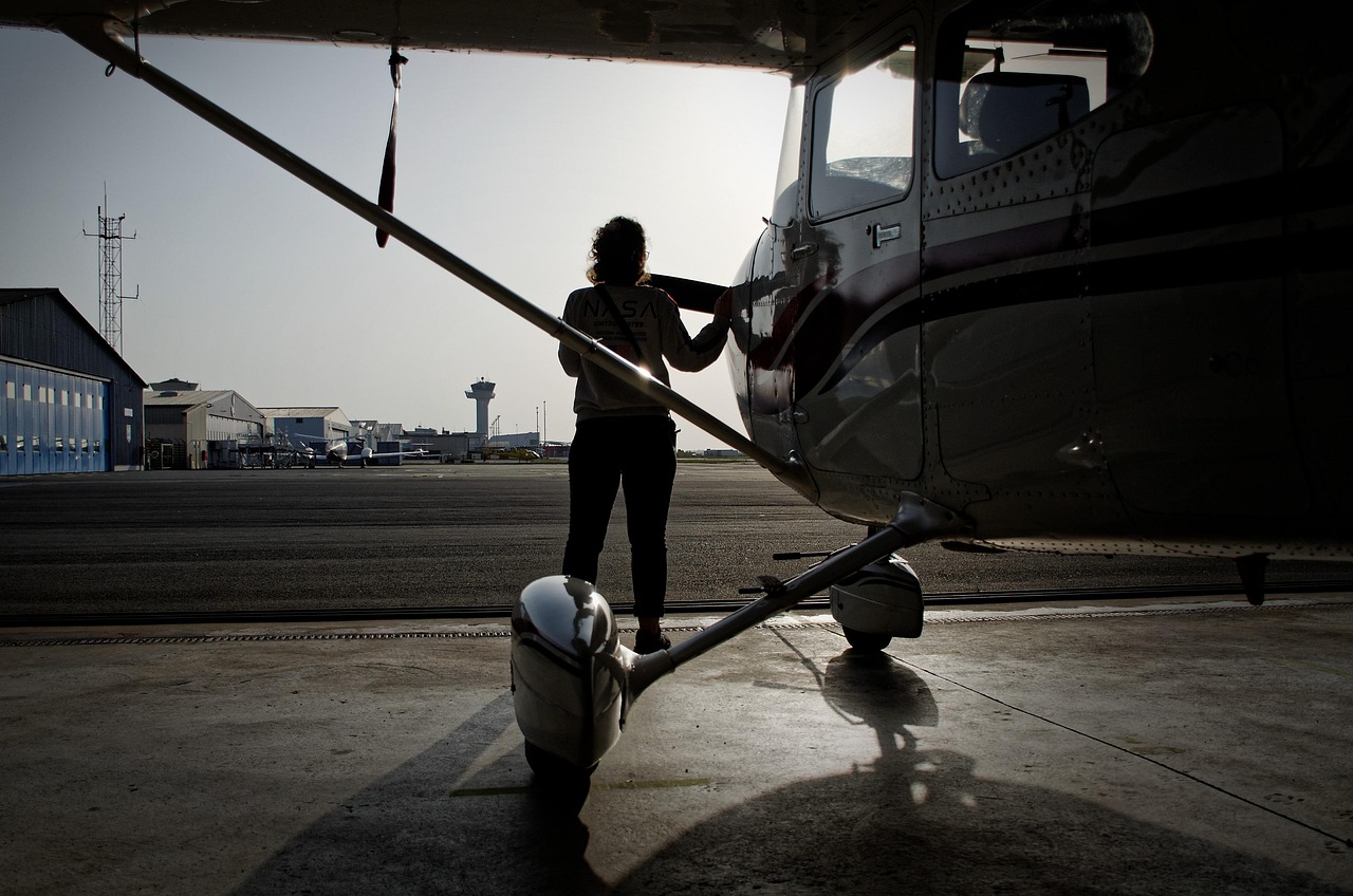 Airline Pilot Interview Questions and Answers (2026 Guide) 3 Student pilot performing a preflight walk-around check on a small aircraft