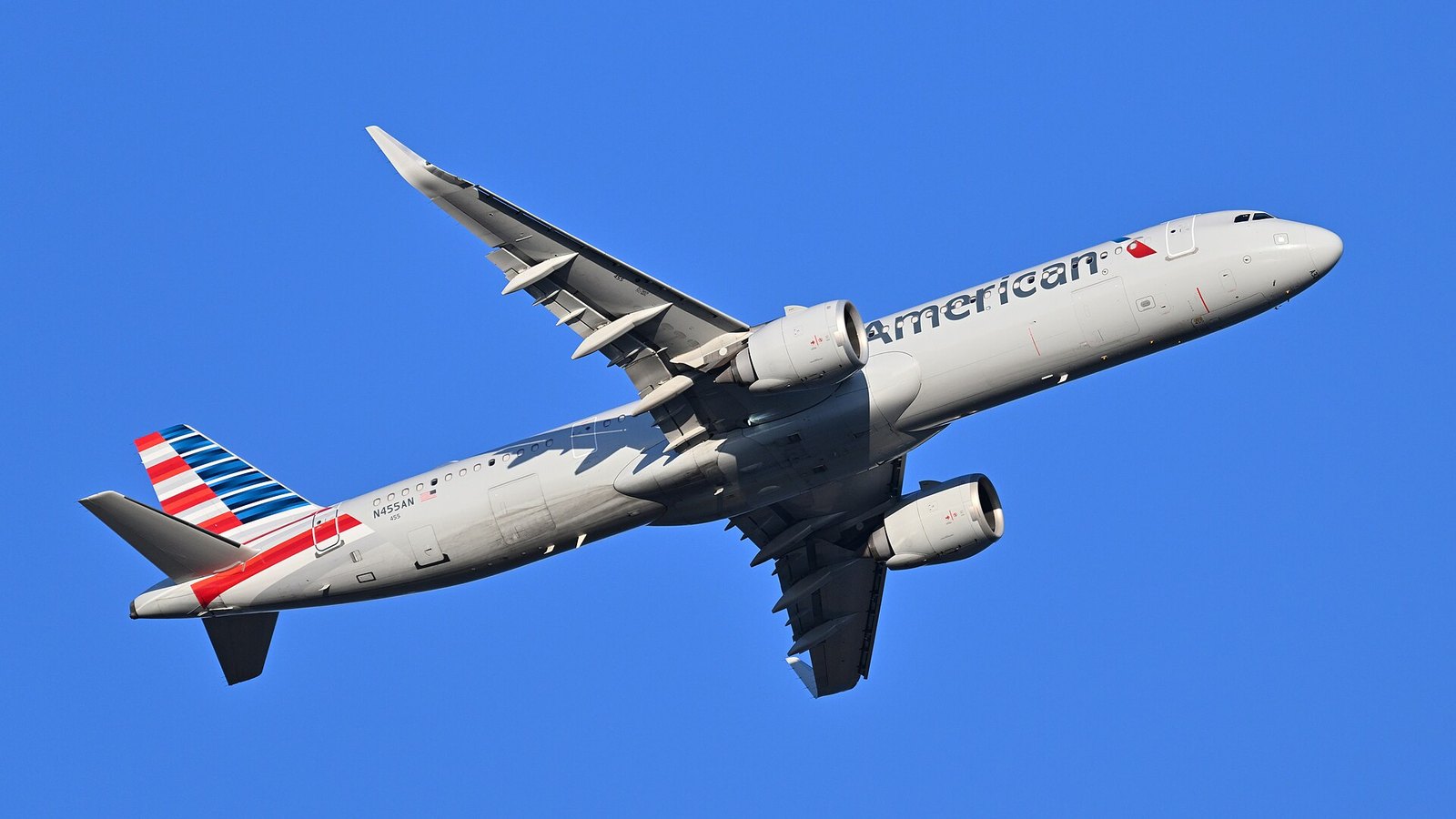 The 737 MAX 10 Is Certified: What the FAA Approved and Who Gets It First 4 An American Airlines Airbus A321neo climbing away after departure from Boston against a clear blue sky