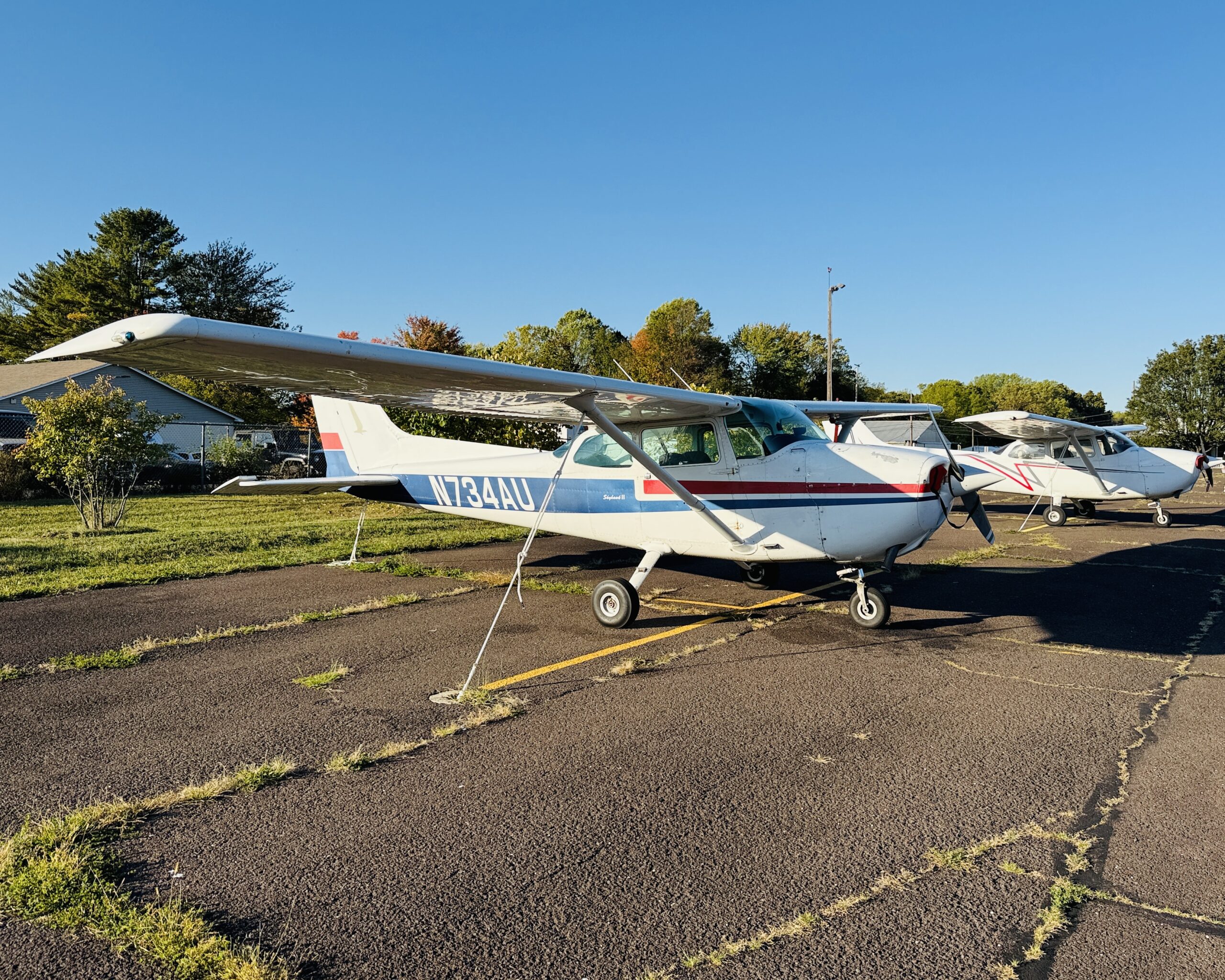 What Aircraft Insurance Actually Costs a Private Owner in 2026 6 A Cessna 172N Skyhawk tied down on an airfield apron